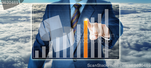 Image of Torso Of Manager Selecting A Bar In Growth Chart