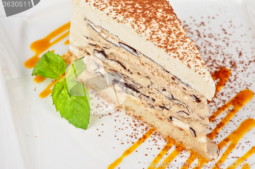 Image of chocolate cake with jam ice cream