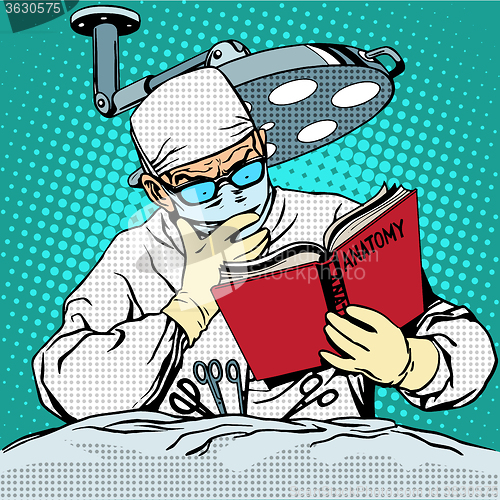 Image of The surgeon before surgery is reading anatomy. Medicine and heal