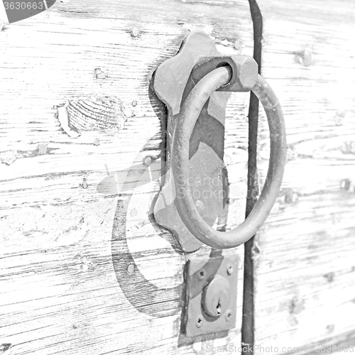 Image of europe old in  italy  antique close brown door and rusty lock  c