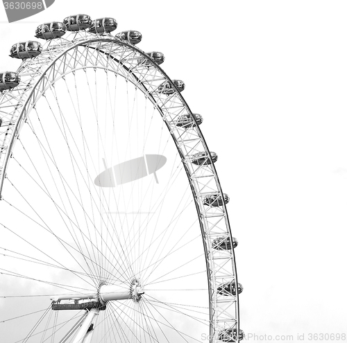 Image of london eye in the spring sky and white clouds