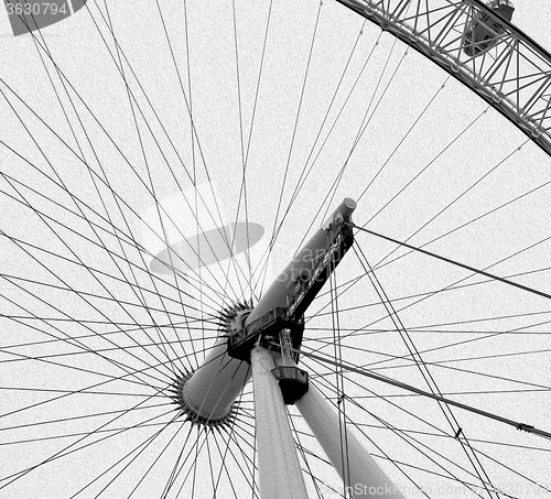 Image of london eye in the spring sky and white clouds