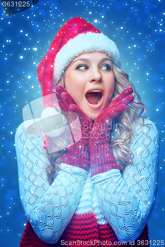 Image of portrait of girl dressed in santa hat 