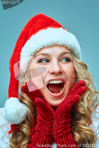 Image of portrait of girl dressed in santa hat 