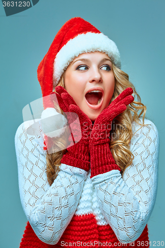 Image of portrait of girl dressed in santa hat 