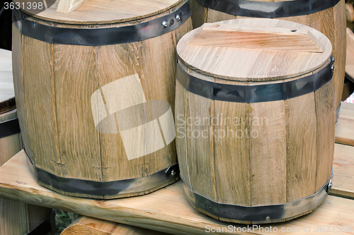 Image of Wooden oak barrels for storing wine.