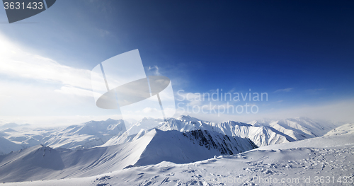 Image of Panoramic view on snowy mountains at nice day