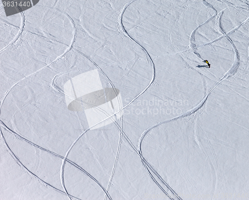 Image of Snowboarder downhill on off piste slope