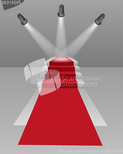 Image of stairs with red carpet and three lights