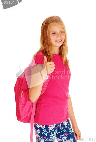 Image of Smiling schoolgirl with her thumps up.
