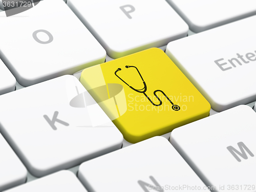 Image of Healthcare concept: Stethoscope on computer keyboard background