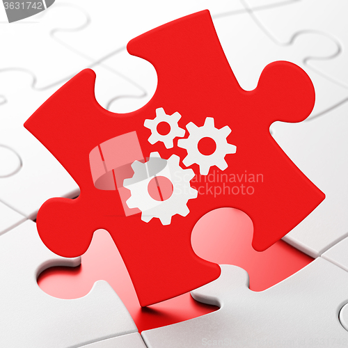 Image of Advertising concept: Gears on puzzle background