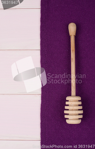 Image of Kitchenware on purple towel