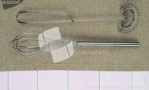 Image of Kitchenware on beige towel