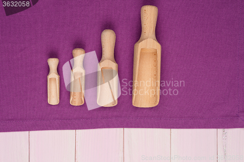 Image of Kitchenware on purple towel