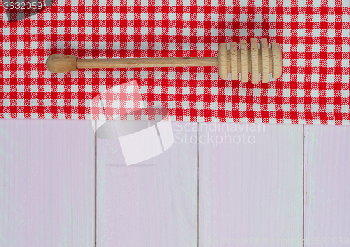 Image of Kitchenware on red towel