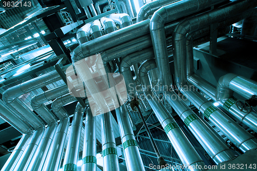 Image of Industrial zone, Steel pipelines and equipment in blue tone