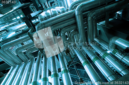 Image of Industrial zone, Steel pipelines and equipment in blue tone