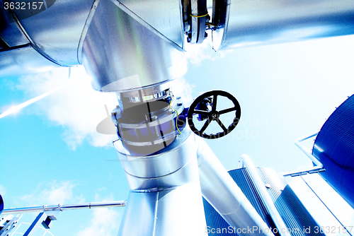 Image of Industrial zone, Steel pipelines in blue tones  