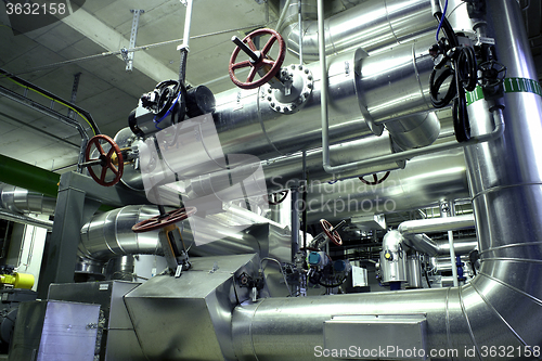 Image of Equipment, cables and piping as found inside of a modern industr