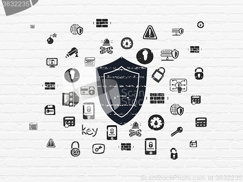 Image of Privacy concept: Shield on wall background