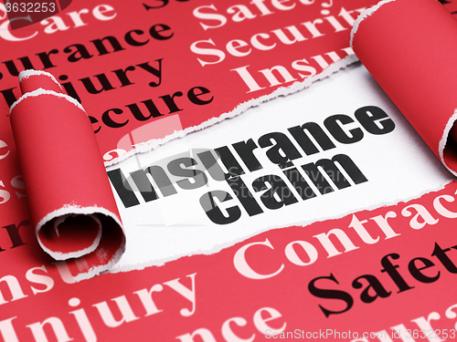 Image of Insurance concept: black text Insurance Claim under the piece of  torn paper