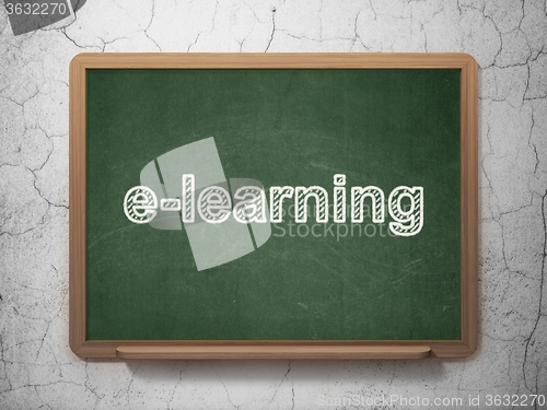 Image of Learning concept: E-learning on chalkboard background