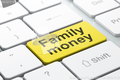 Image of Currency concept: Family Money on computer keyboard background