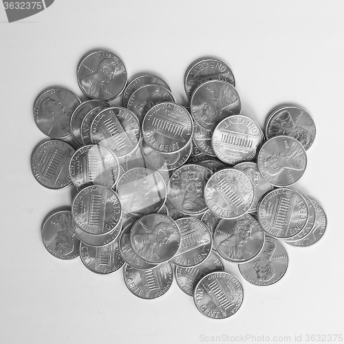 Image of Black and white Dollar coins 1 cent