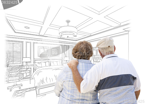 Image of Senior Couple Looking Over Custom Bedroom Design Drawing