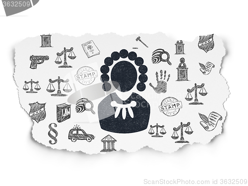 Image of Law concept: Judge on Torn Paper background