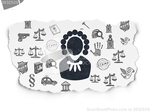 Image of Law concept: Judge on Torn Paper background