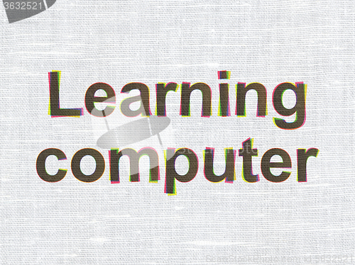 Image of Studying concept: Learning Computer on fabric texture background