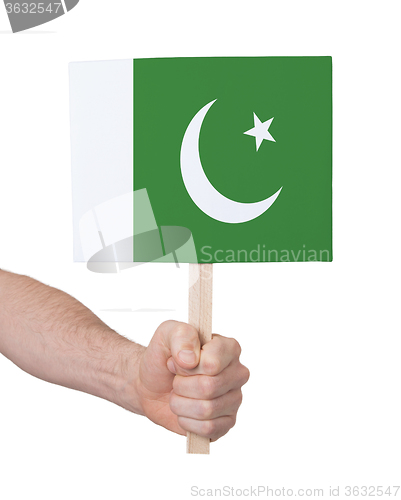 Image of Hand holding small card - Flag of Pakistan