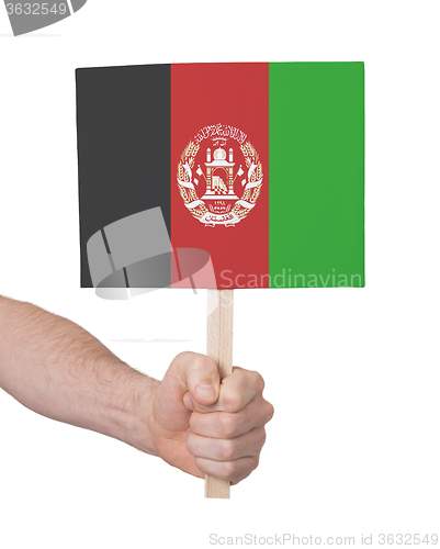 Image of Hand holding small card - Flag of Afghanistan