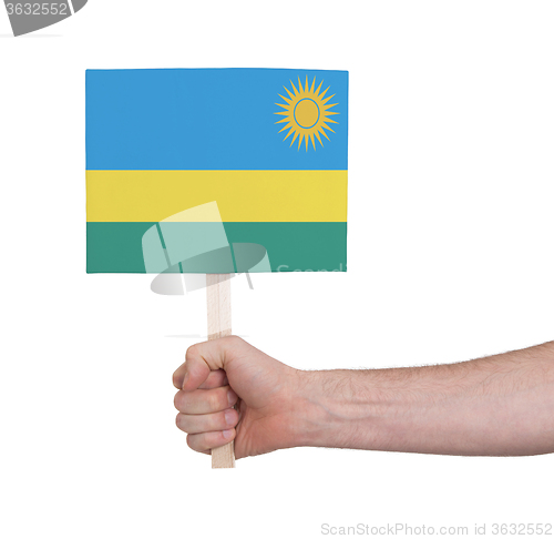 Image of Hand holding small card - Flag of Rwanda