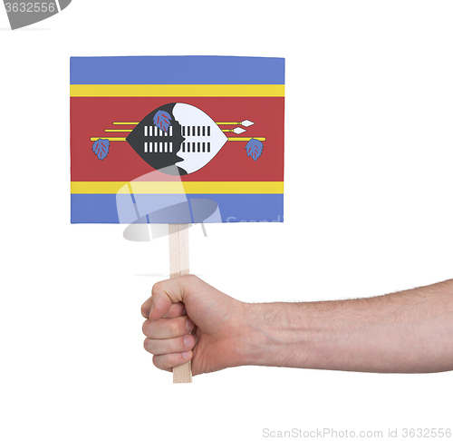 Image of Hand holding small card - Flag of Swaziland