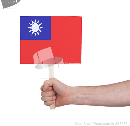 Image of Hand holding small card - Flag of Taiwan