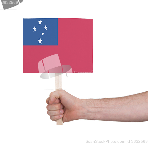 Image of Hand holding small card - Flag of Samoa