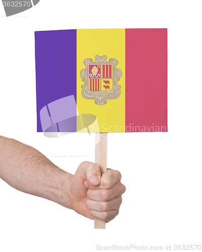 Image of Hand holding small card - Flag of Andorra