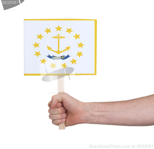 Image of Hand holding small card - Flag of Rhode Island