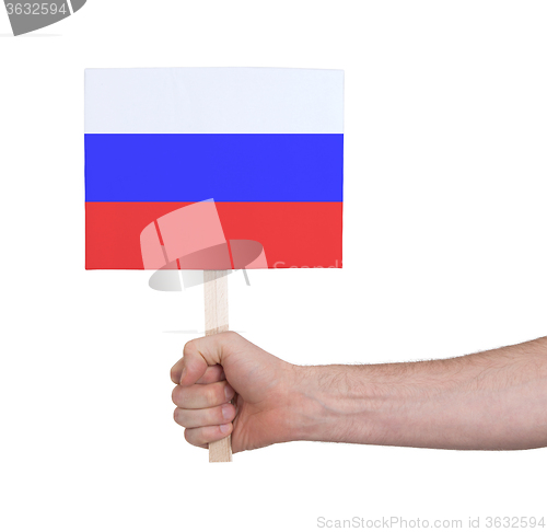 Image of Hand holding small card - Flag of Russia