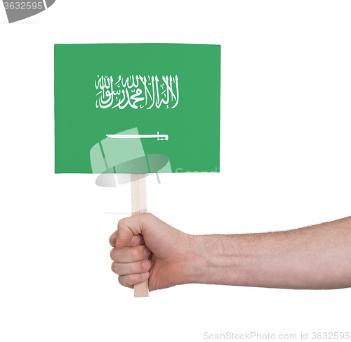 Image of Hand holding small card - Flag of Saudi Arabia