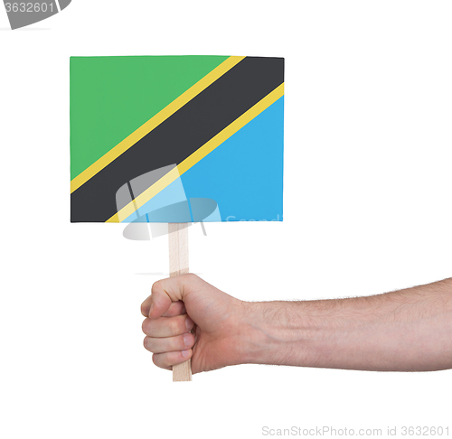 Image of Hand holding small card - Flag of Tanzania