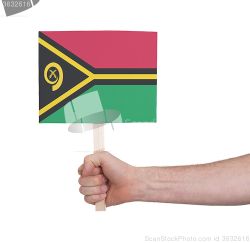 Image of Hand holding small card - Flag of Vanuatu
