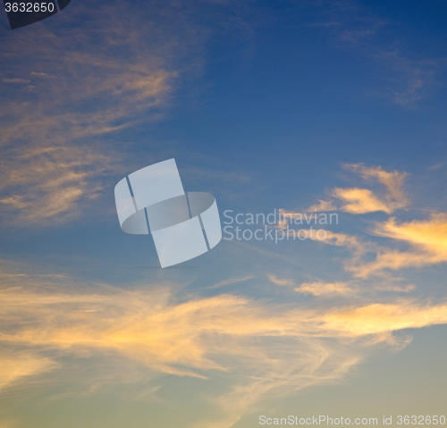 Image of the sunrise in  colored sky white soft clouds and abstract backg