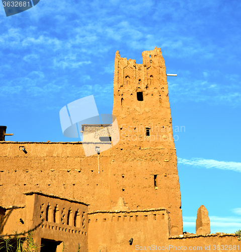 Image of africa  in histoycal maroc  old construction  and the blue cloud