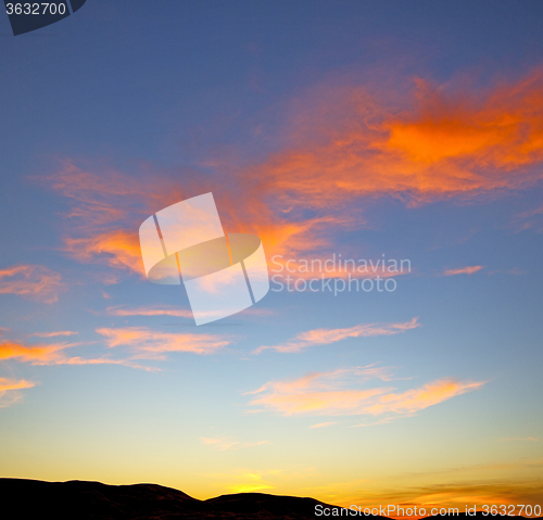 Image of the sunrise in  mountain  soft clouds  