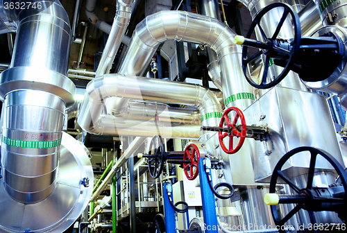 Image of Equipment, cables and piping as found inside of a modern industr