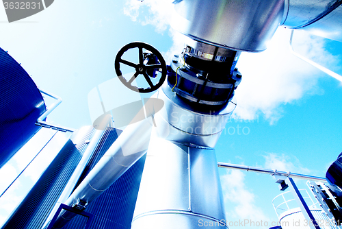 Image of Industrial zone, Steel pipelines in blue tones  